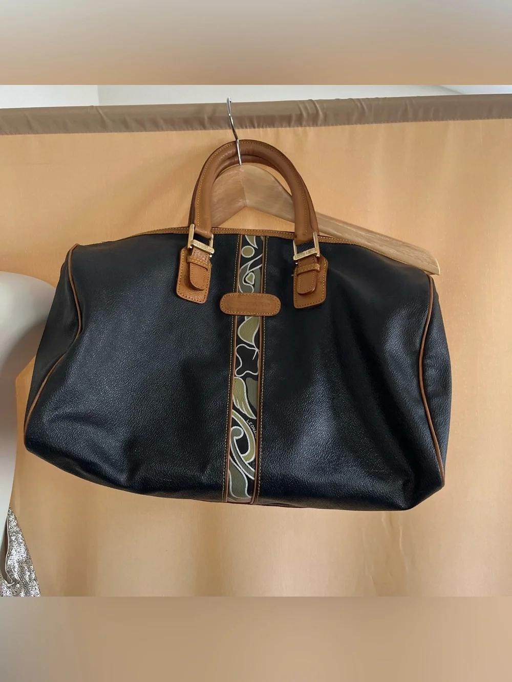 Black Leather Duffel Bag with Brown Trim and Olive Pattern Accent